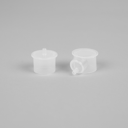Close-up of LacTeck SleepyMommy Adapter showing precise connectors between flange and bottle adapter for secure and efficient breast pumping.