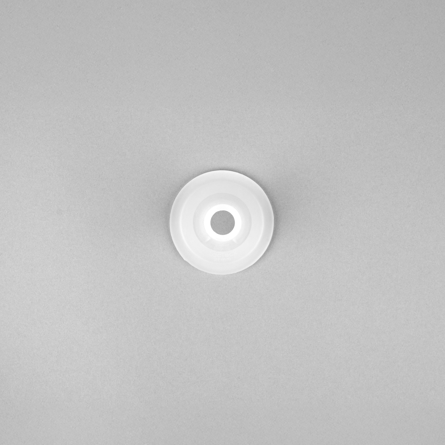 Close-up view of flexible silicone breast pump flange with smooth texture for gentle pumping